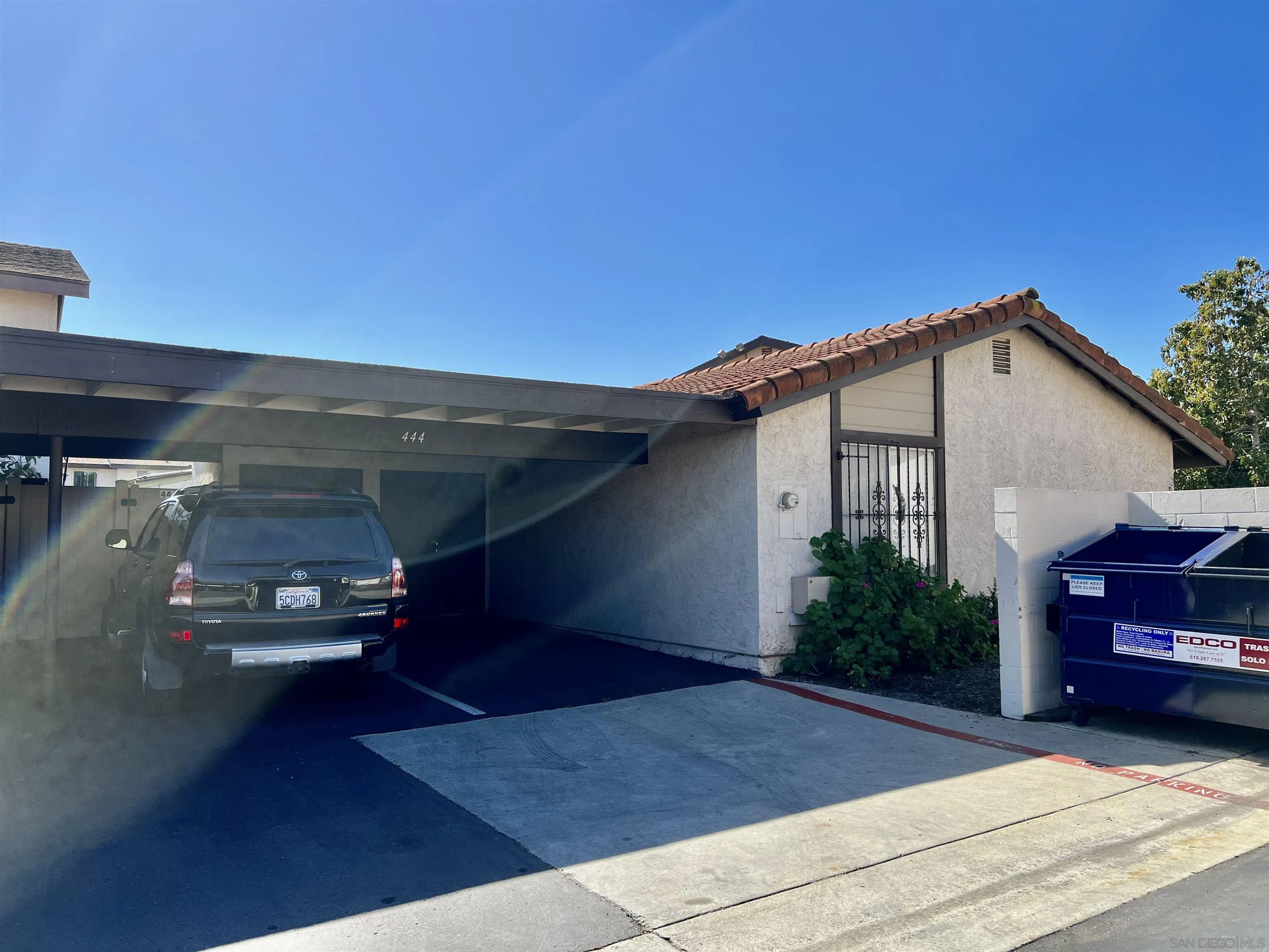 444 Bluffview Road Spring Valley, CA 91977 - Photo 6 of 34 a view of a car park in front of house