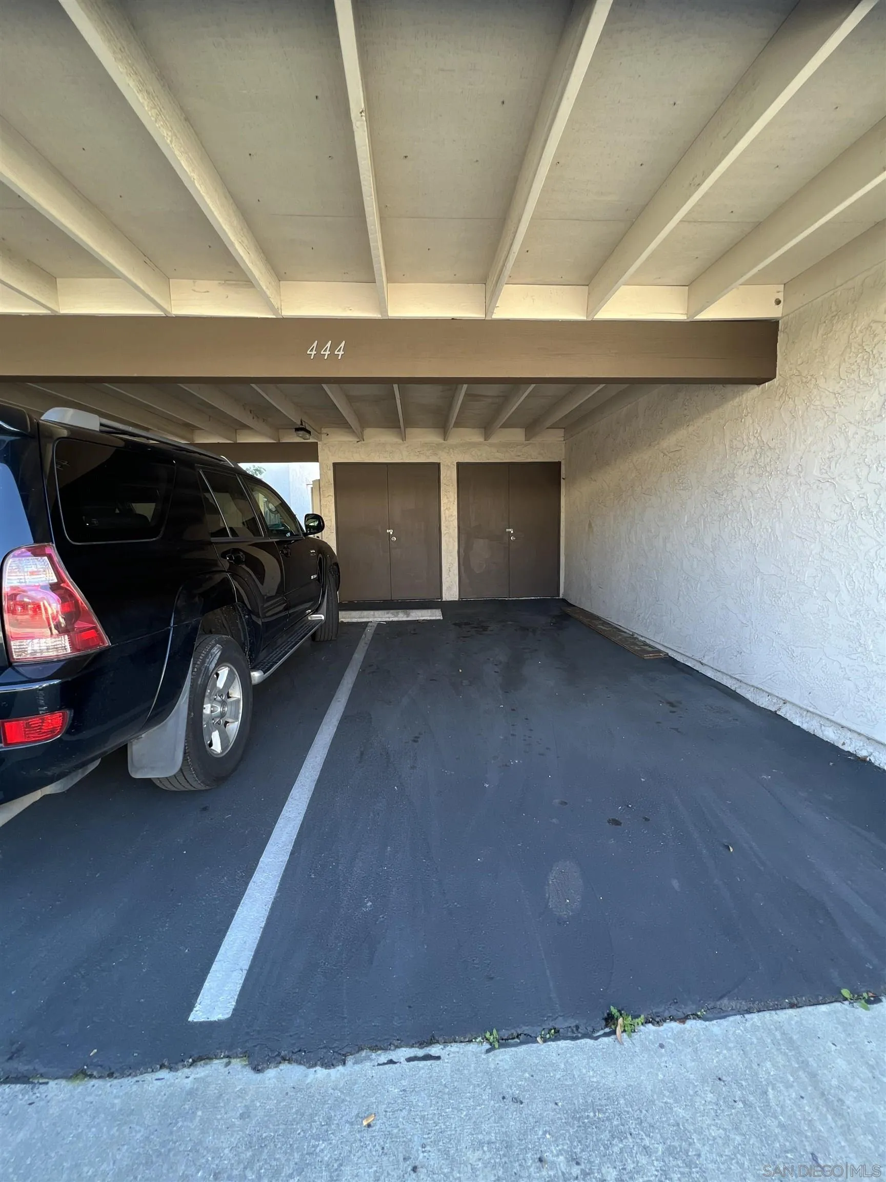 444 Bluffview Road Spring Valley, CA 91977 - Photo 8 of 34 a view of parking garage with cars