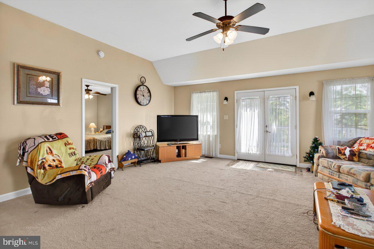 1751 Orchard Road Mount Jackson, VA 22842 - Photo 14 of 30 a living room with furniture and a flat screen tv