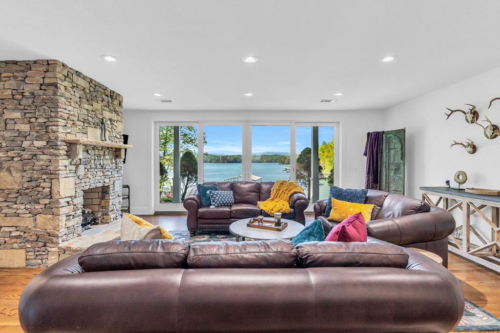 703 Cherokee Hill Road Hiawassee, GA 30546 - Photo 12 of 23 a living room with furniture and a large window