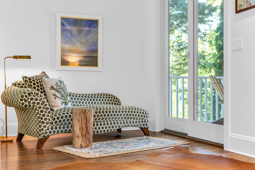 703 Cherokee Hill Road Hiawassee, GA 30546 - Photo 8 of 23 a view of empty room with wooden floor and fan