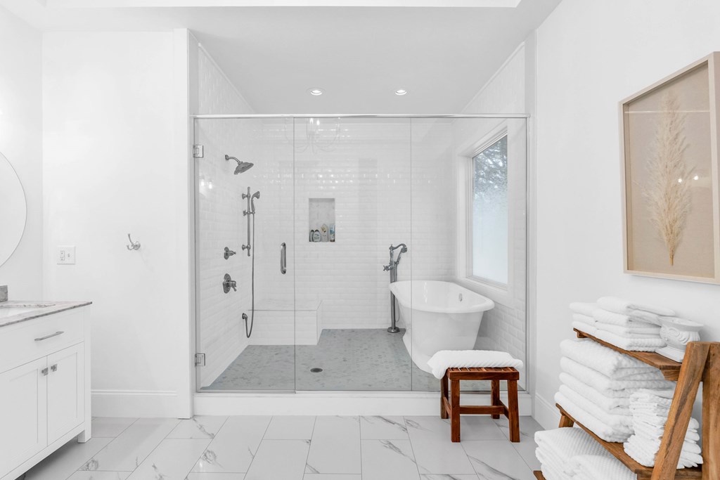 703 Cherokee Hill Road Hiawassee, GA 30546 - Photo 9 of 23 a bathroom with a granite countertop sink a toilet and shower