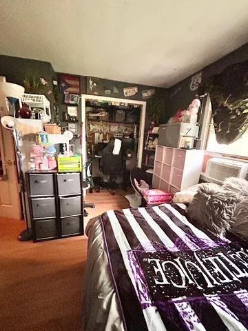 a room with furniture and a flat screen tv