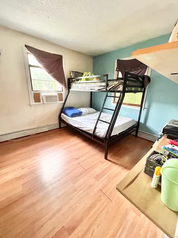 a view of livingroom with furniture and flat screen tv