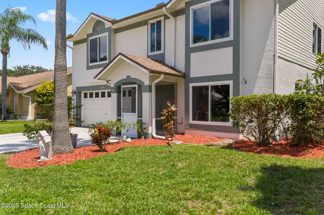 a view of backyard with green space