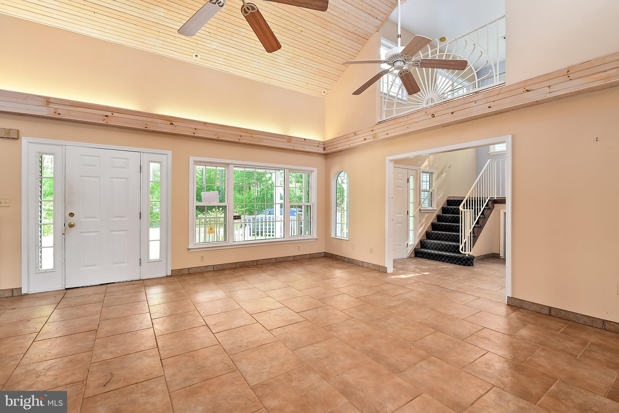 9502 Croppers Island Road Newark, MD 21841 - Photo 22 of 46 GRACIOUS FOYER: VAULTED PLANK CEILING