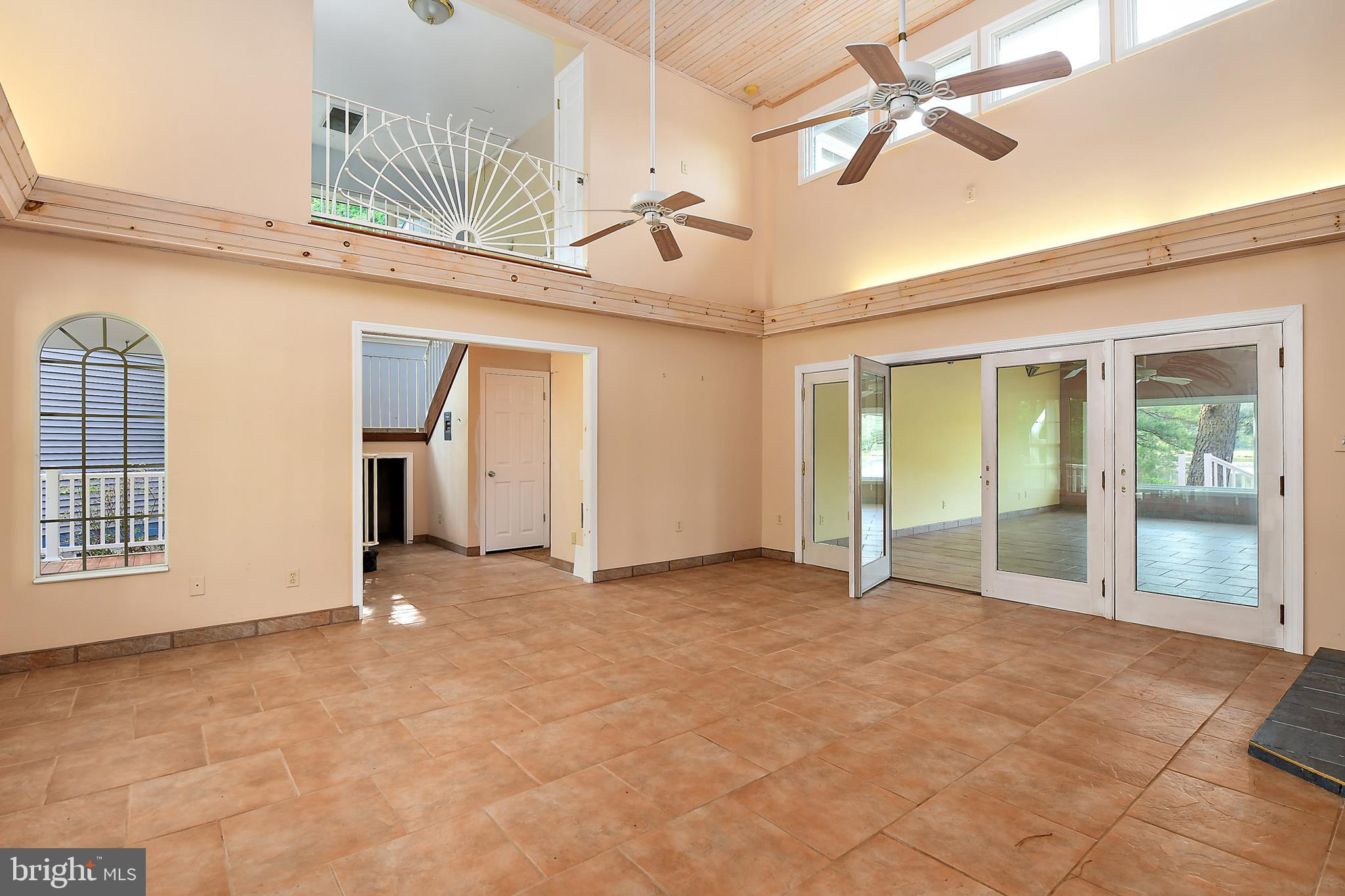 9502 Croppers Island Road Newark, MD 21841 - Photo 23 of 46 FOYER to WATER FRONT LIVING ROOM
