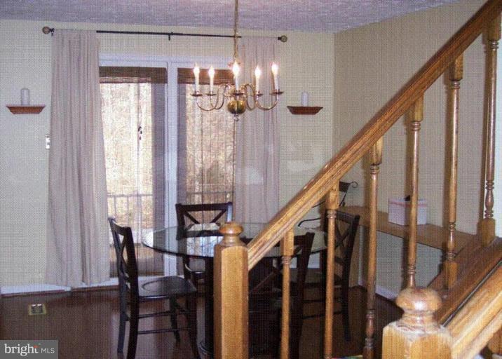 7546 Aspenpark Road Lorton, VA 22079 - Photo 3 of 5 Dining room has a great view of woodlands!