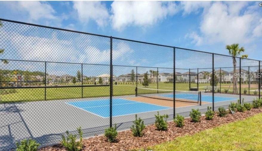 2667 Skyline Loop Kissimmee, FL 34758 - Photo 11 of 13 a view of a backyard