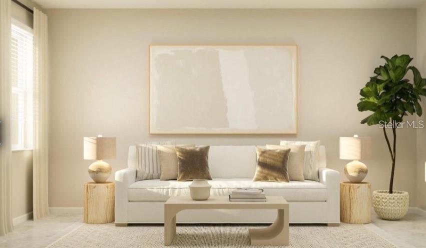 2667 Skyline Loop Kissimmee, FL 34758 - Photo 3 of 13 a living room with furniture and a potted plant