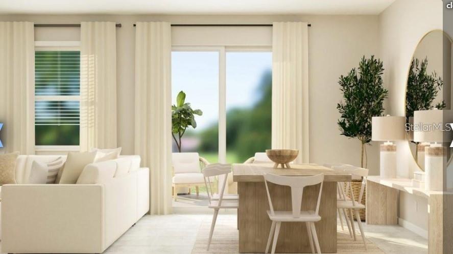 2667 Skyline Loop Kissimmee, FL 34758 - Photo 6 of 13 a dining room with furniture and window