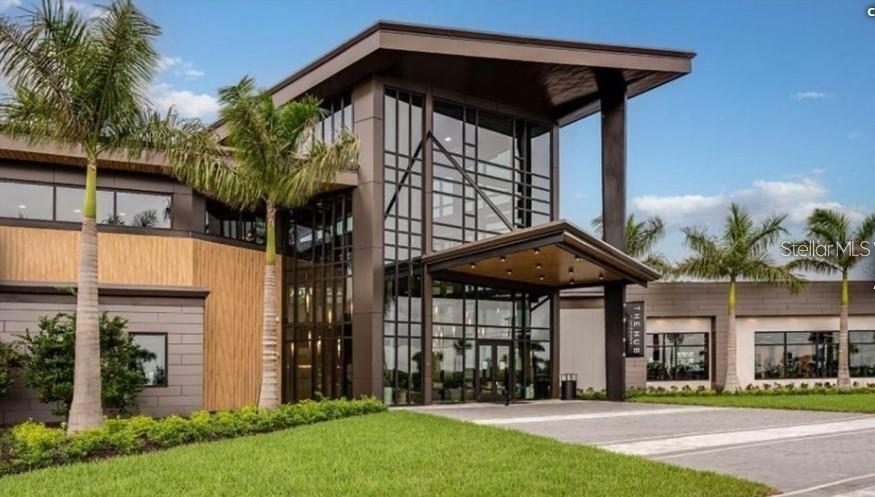 2667 Skyline Loop Kissimmee, FL 34758 - Photo 10 of 13 a front view of a house with a garden