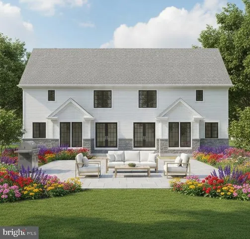 a front view of house with yard and seating area