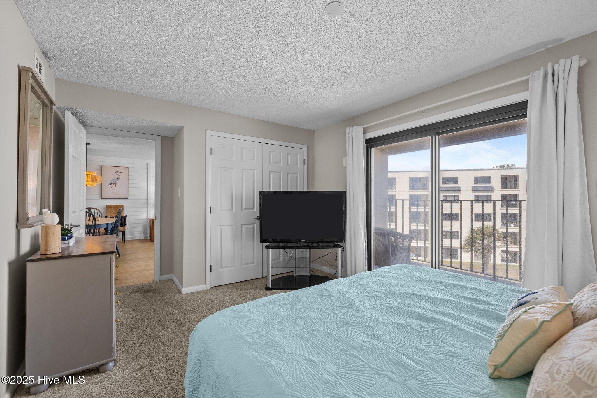 1505 Salter Path Road, Unit 409 Indian Beach, NC 28512 - Photo 18 of 35 Master Bedroom