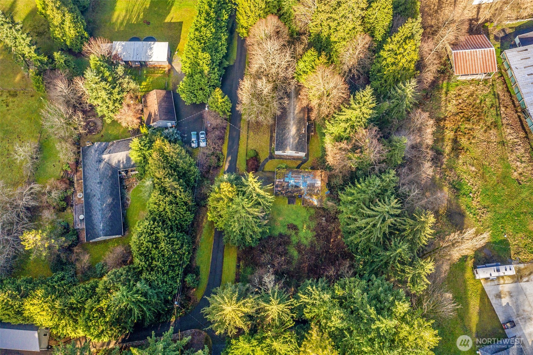 20115 49th Drive Southeast Bothell, WA 98012 - Photo 6 of 35 an aerial view of a residential apartment building with a yard