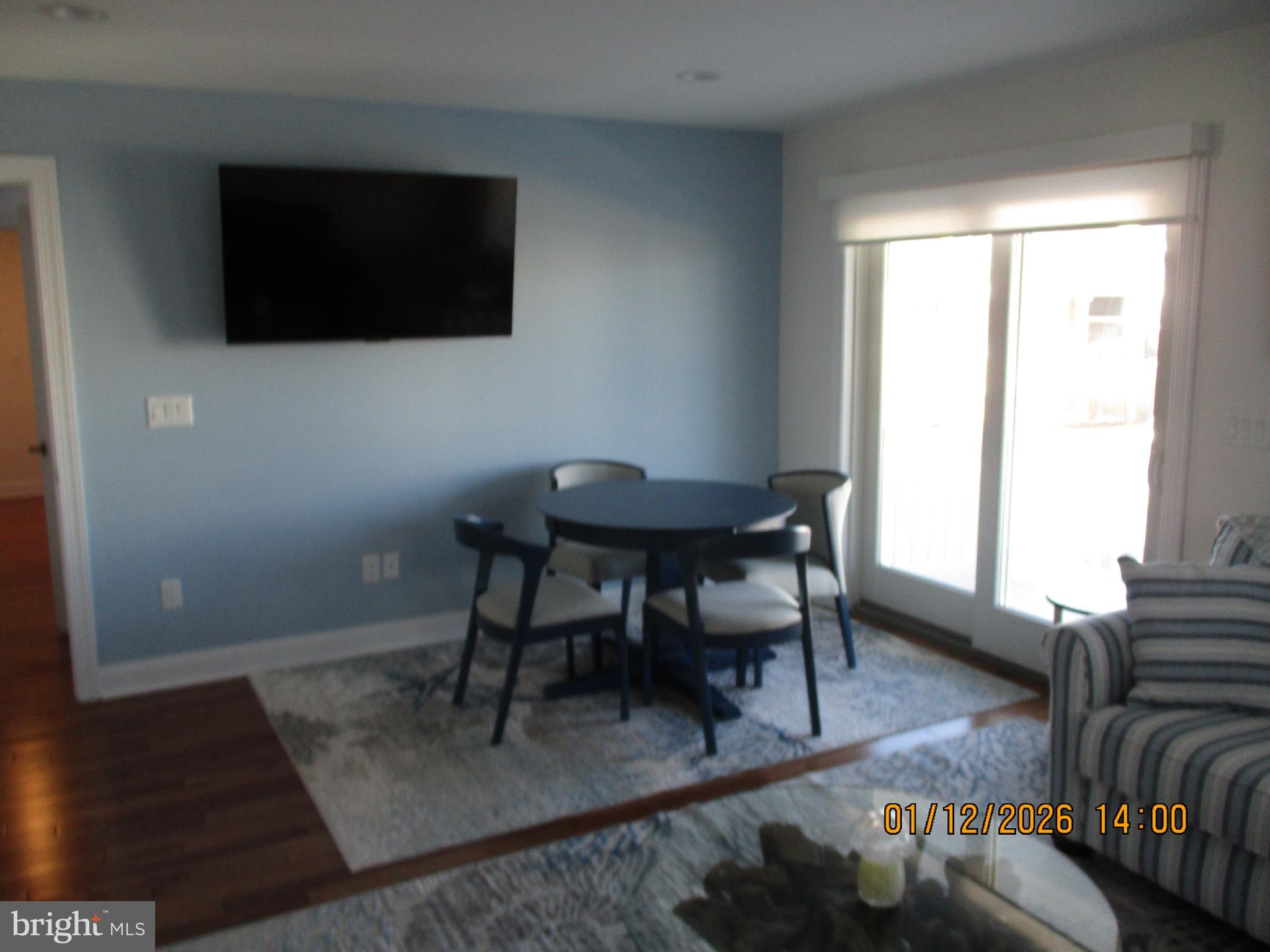24 West 53rd Street Long Beach Township, NJ 08008 - Photo 10 of 75 a view of a livingroom with furniture window and wooden floor