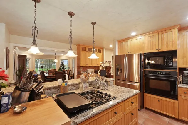 a bathroom with a sink a mirror and a shower