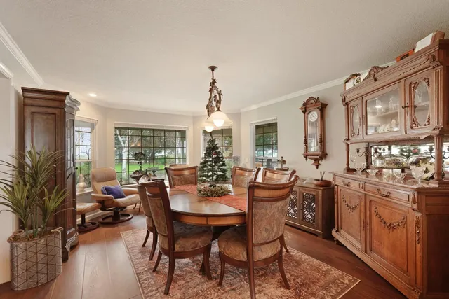 a view of a swimming pool with a lounge chairs