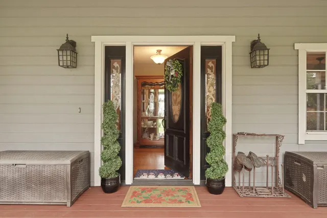 a kitchen with stainless steel appliances kitchen island granite countertop a sink and cabinets
