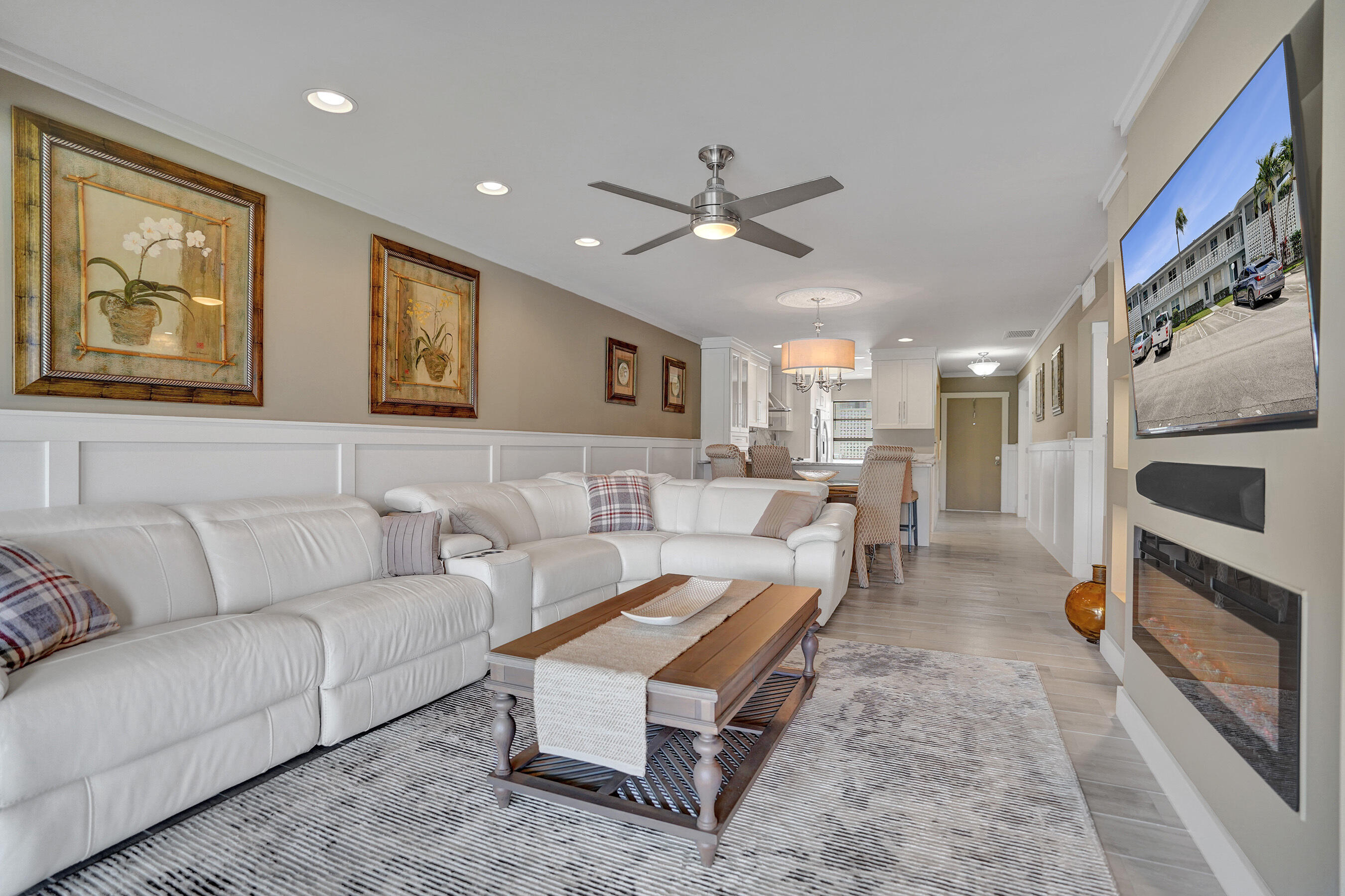 2820 Southwest 13th Street, Unit 101 Delray Beach, FL 33445 - Photo 49 of 83 Living room to dining area