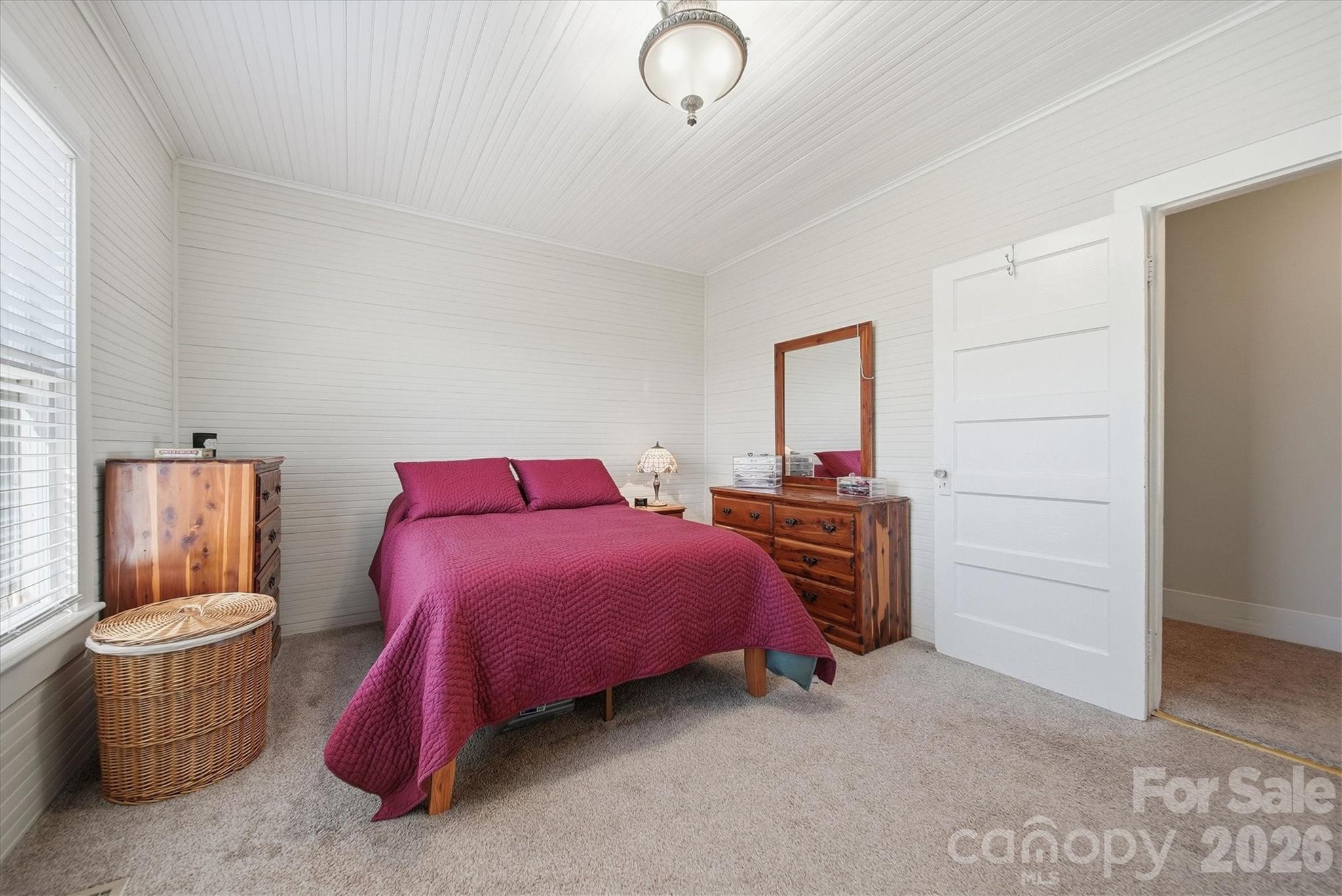 113 Leonhardt Road Morganton, NC 28655 - Photo 18 of 44 a bedroom with a bed and furniture