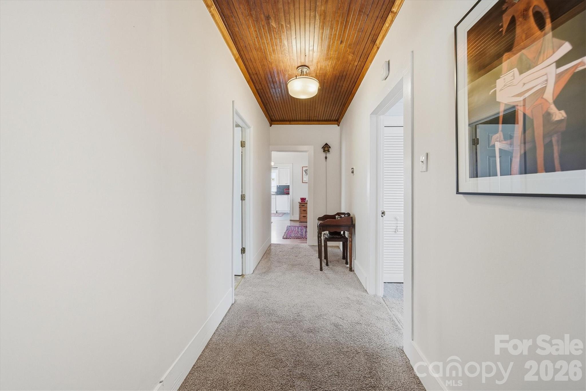113 Leonhardt Road Morganton, NC 28655 - Photo 36 of 44 a view of a hallway with a dining area