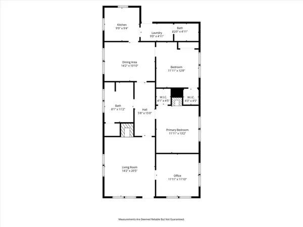 a picture of a bench in front of a wall