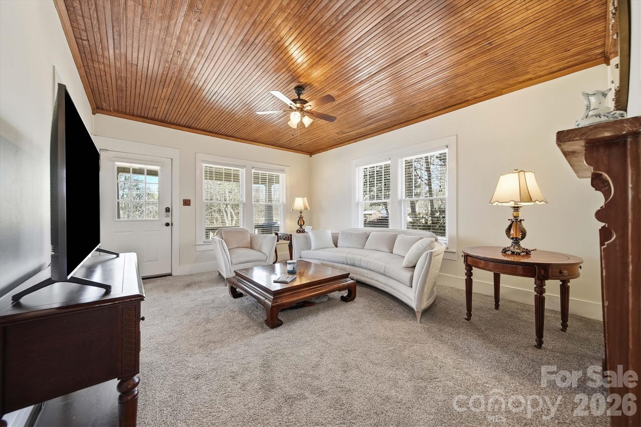 113 Leonhardt Road Morganton, NC 28655 - Photo 5 of 44 a living room with furniture and a flat screen tv