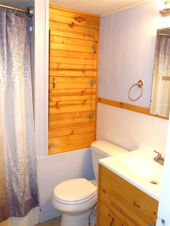 286 North Fm 1851 Voca, TX 76887 - Photo 12 of 23 Full bathroom with toilet, a shower with curtain, and vanity