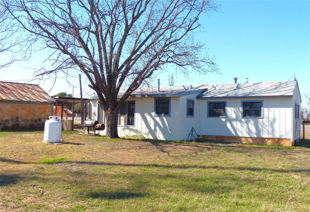 286 North Fm 1851 Voca, TX 76887 - Photo 7 of 23 Back of property featuring a lawn