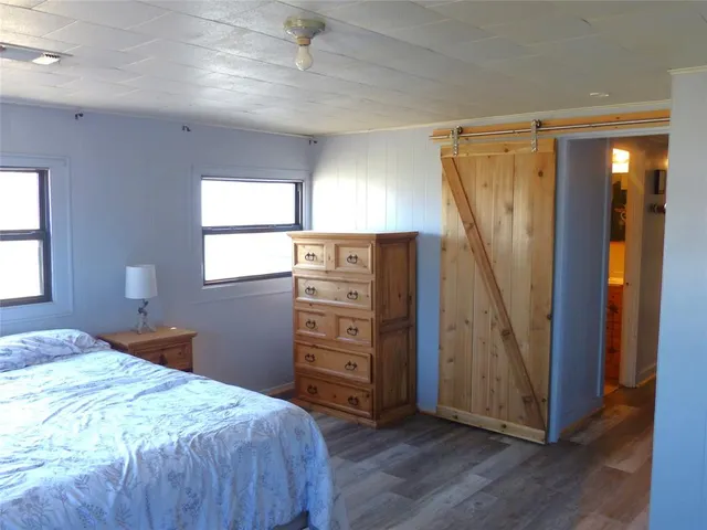 a view of living room with cabinets