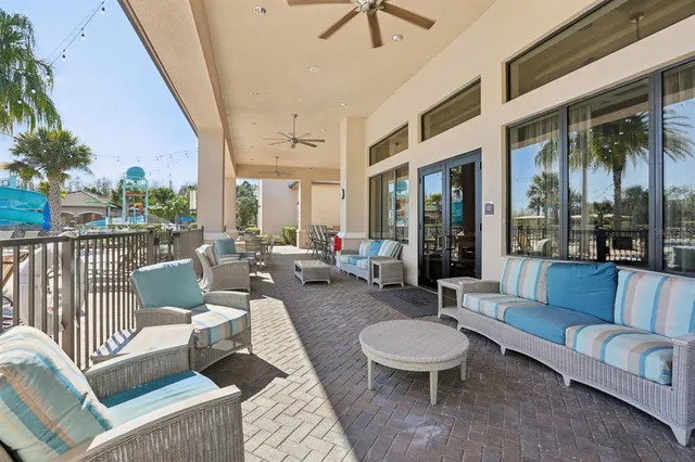 a outdoor living space with patio furniture and a potted plant
