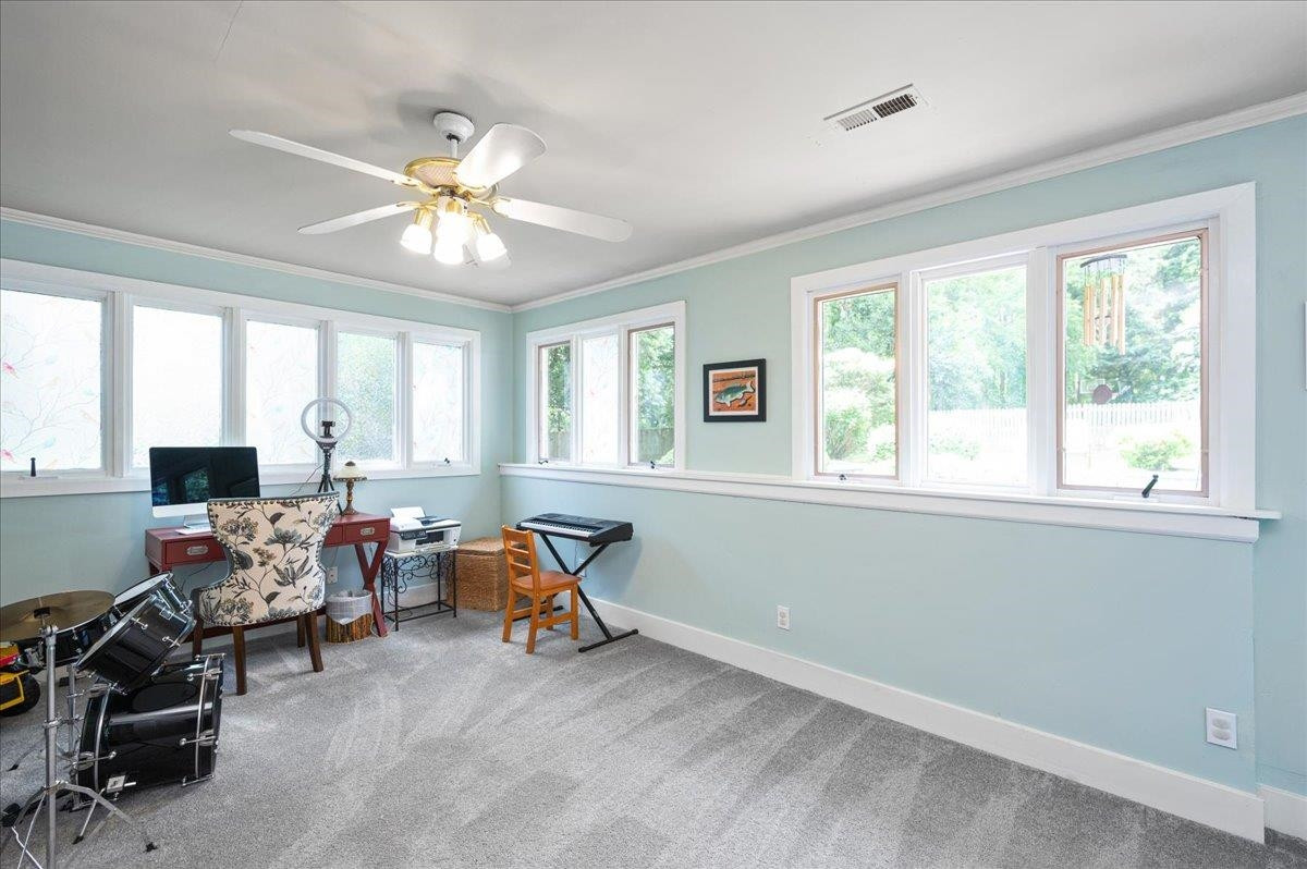 7709 Fiesta Way Raleigh, NC 27615 - Photo 12 of 25 Bedroom or bonus room off the family room on the main floor