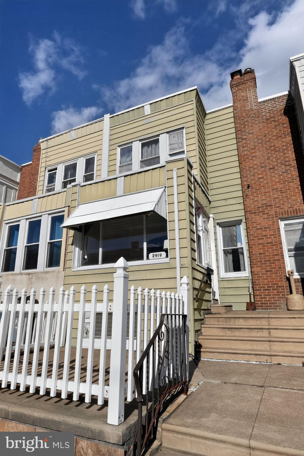 2919 Robbins Street Philadelphia, PA 19149 - Photo 1 of 32 a front view of a house with a porch