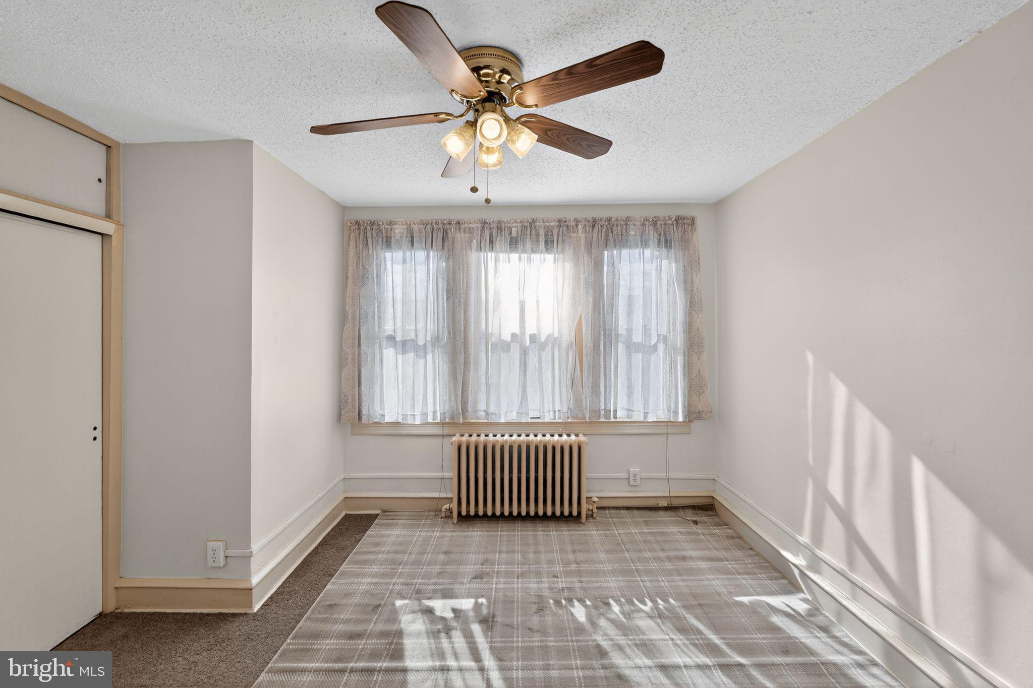 2919 Robbins Street Philadelphia, PA 19149 - Photo 19 of 32 a view of an empty room with a window