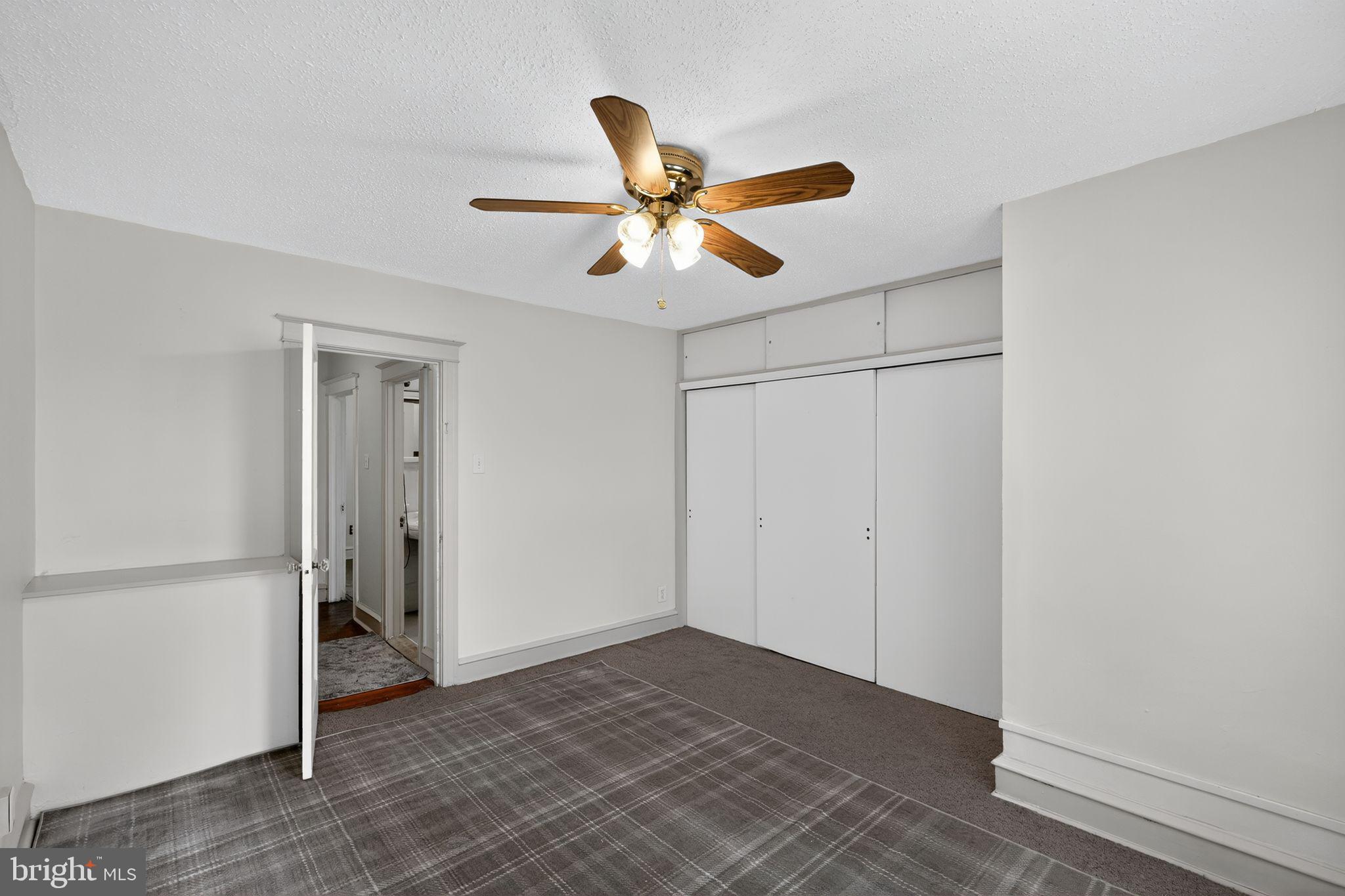 2919 Robbins Street Philadelphia, PA 19149 - Photo 21 of 32 a view of a room with a ceiling fan and a window