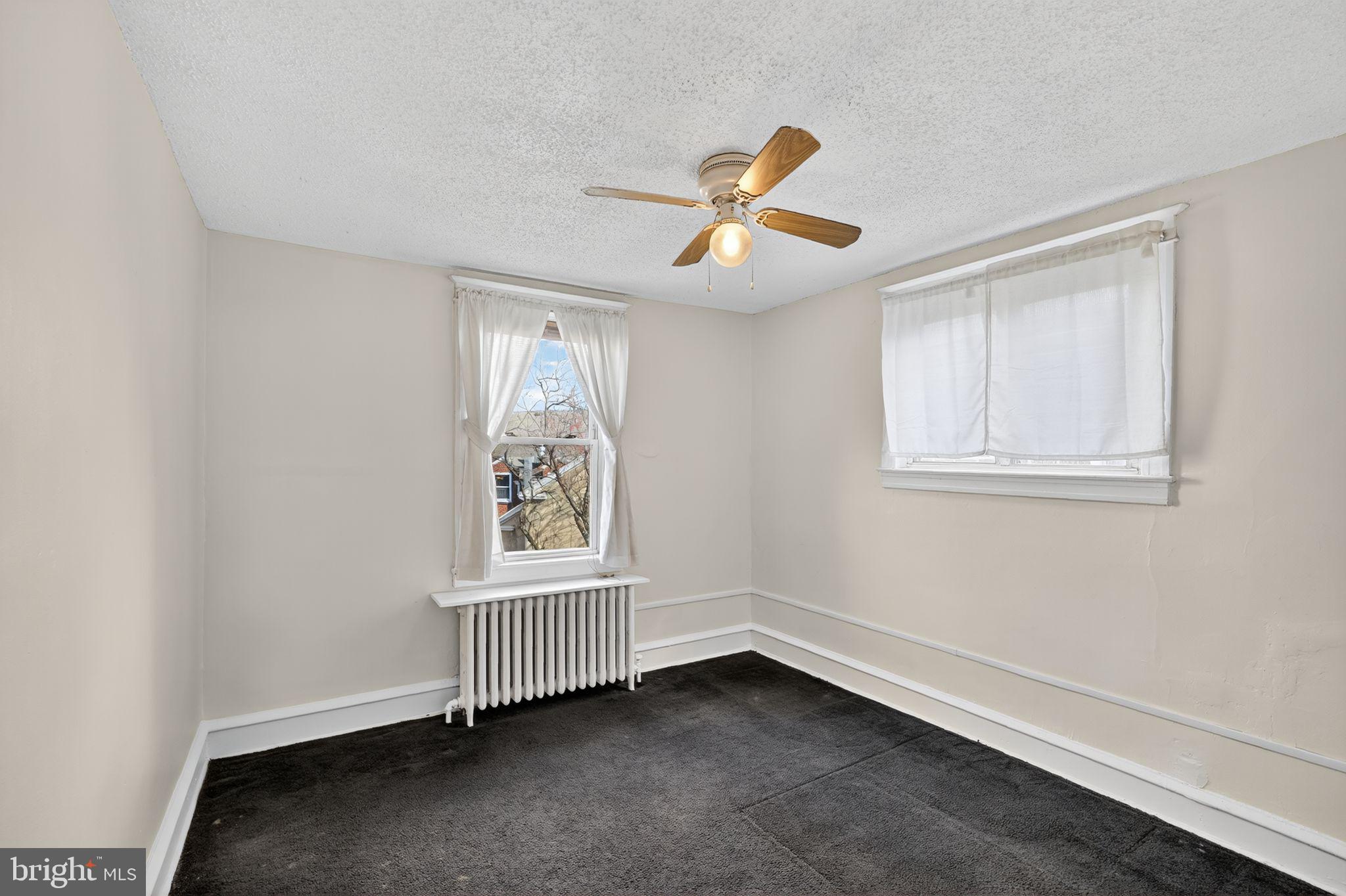 2919 Robbins Street Philadelphia, PA 19149 - Photo 24 of 32 a view of an empty room with a window
