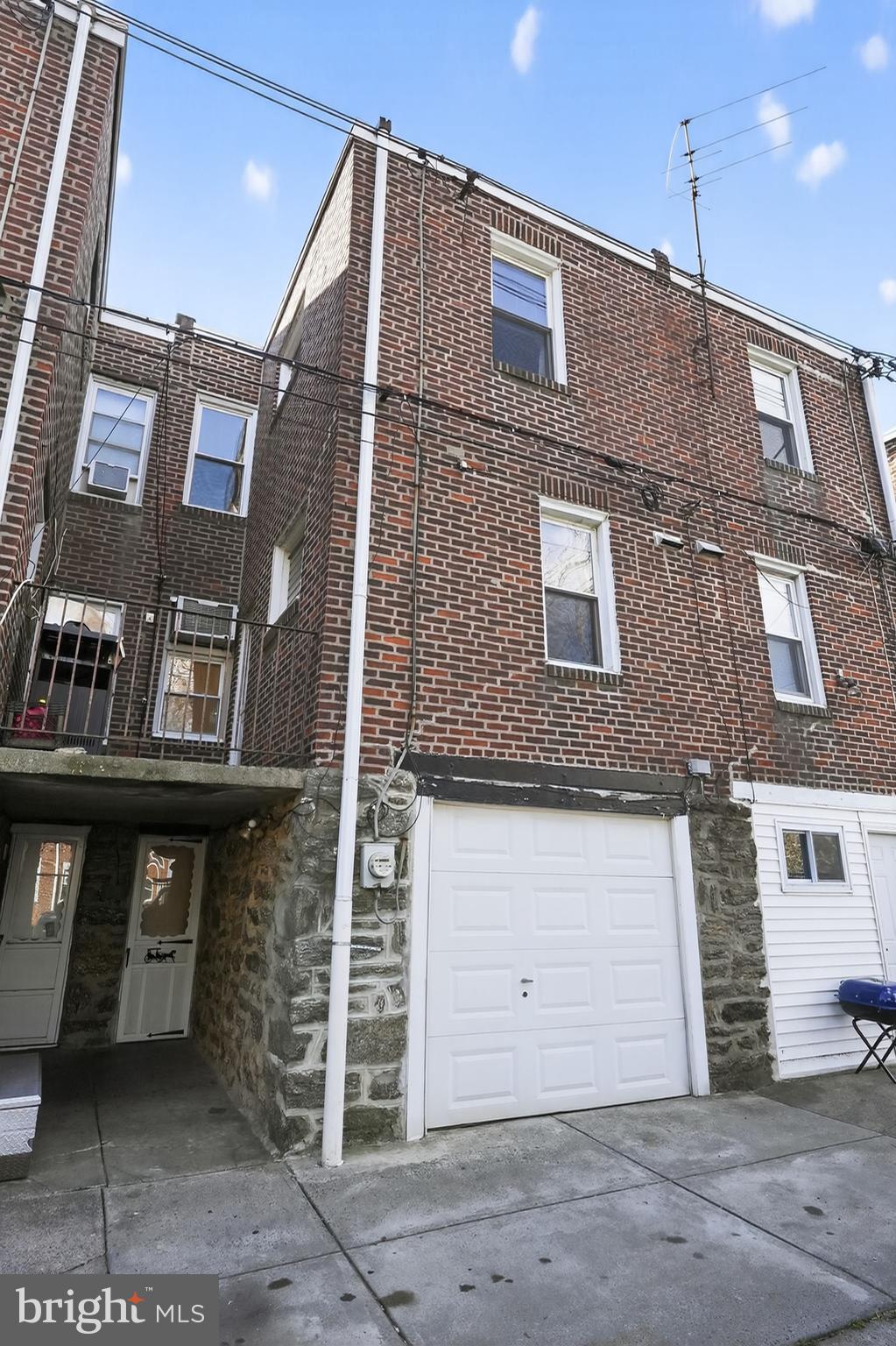 2919 Robbins Street Philadelphia, PA 19149 - Photo 32 of 32 a front view of a building with a brick wall