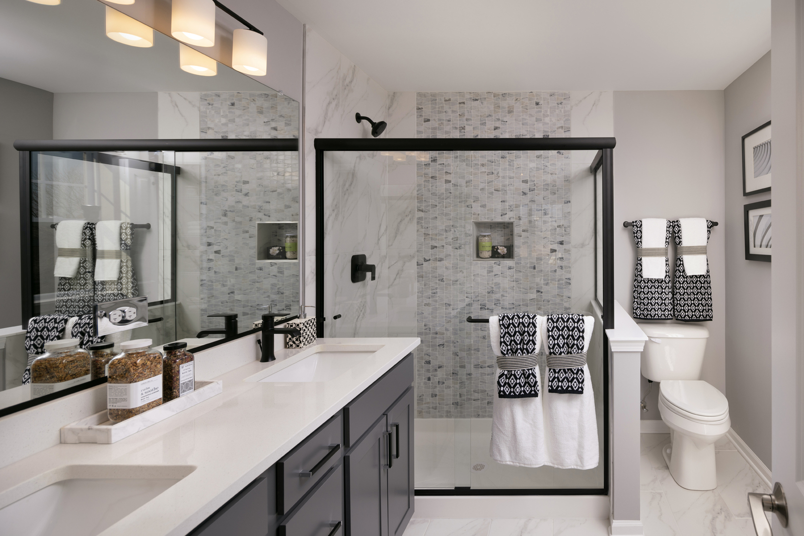 301 Timberleaf Circle Roselle, IL 60172 - Photo 15 of 17 a bathroom with a sink double vanity and a shower