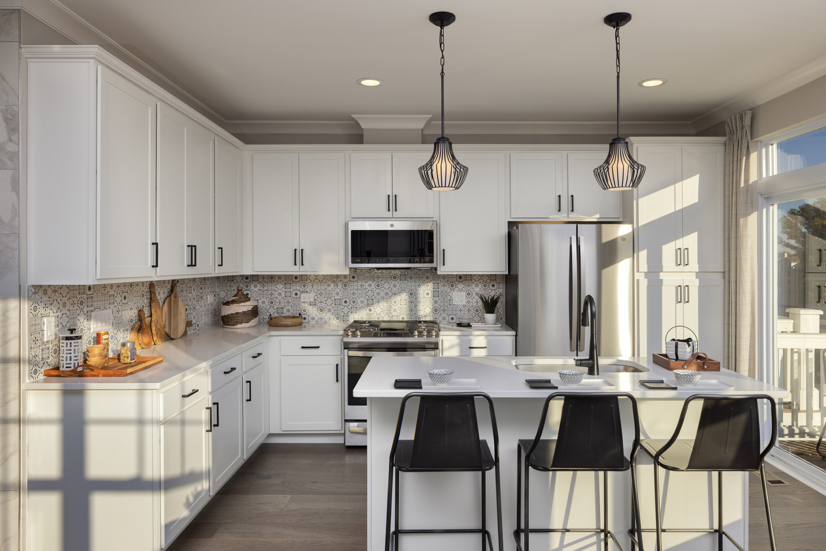 301 Timberleaf Circle Roselle, IL 60172 - Photo 4 of 17 a kitchen with stainless steel appliances granite countertop a sink and a refrigerator