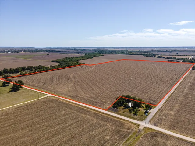 an outdoor space with lounge chair