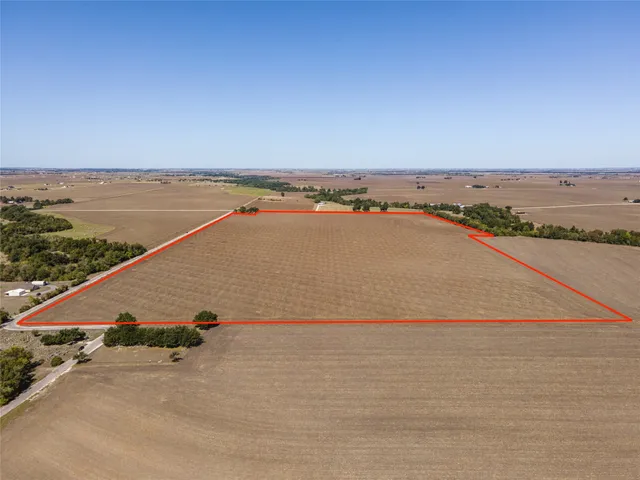 an aerial view of beach and ocean