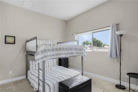 a view of livingroom with furniture and window