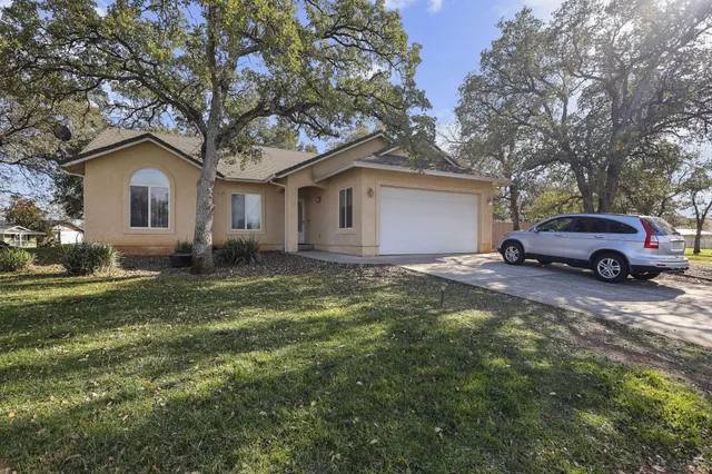 a car parked in front of a house