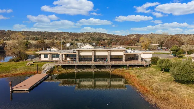 an aerial view of a house with outdoor space