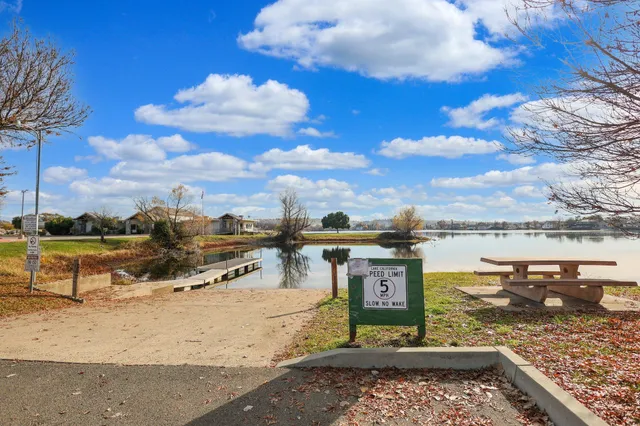 a view of a swimming pool with an outdoor seating