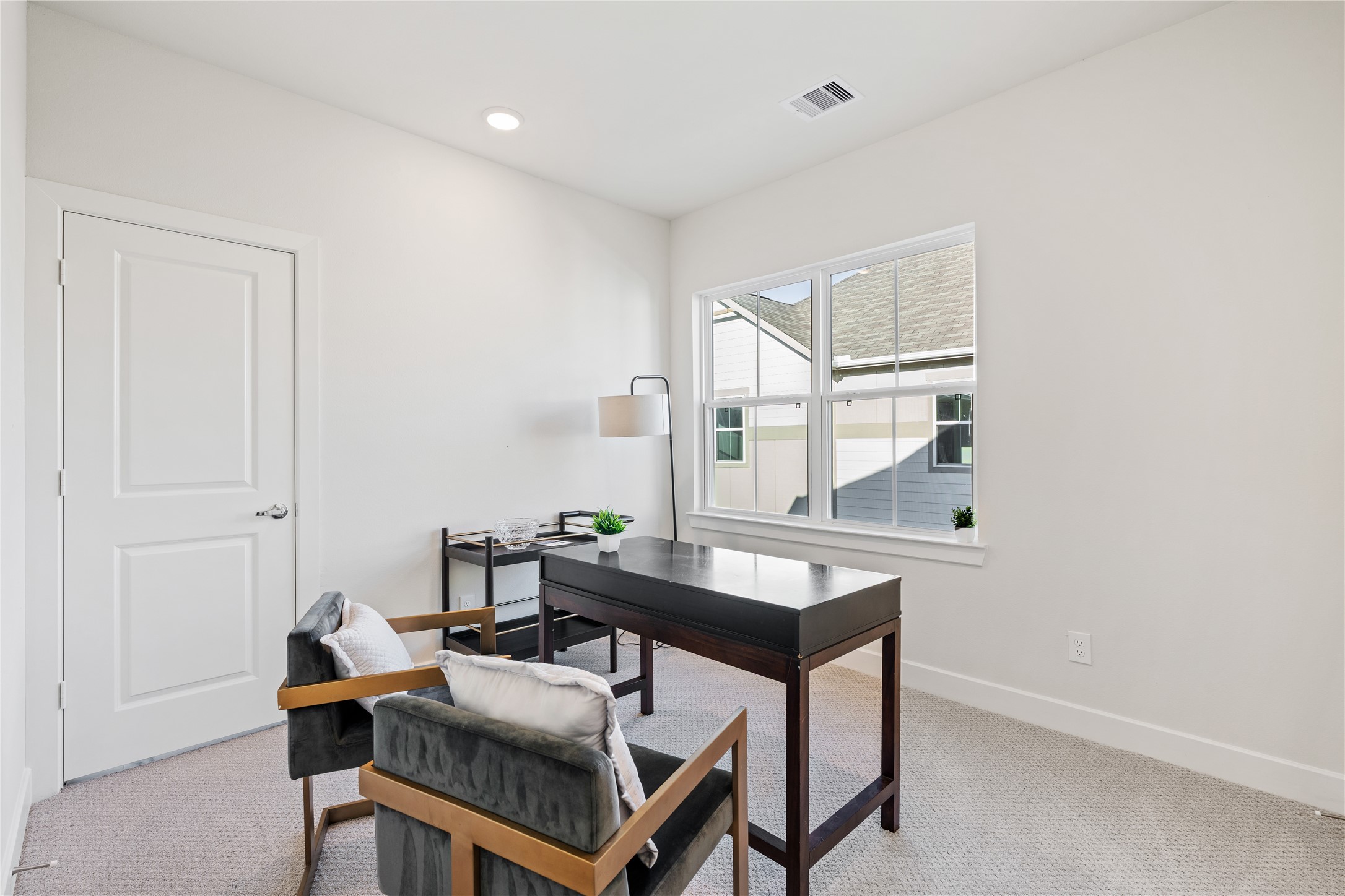 6505 Rena Street Houston, TX 77092 - Photo 21 of 28 Secondary bedroom with a rear-facing window and enough square footage to work as a home office, guest room, or both.