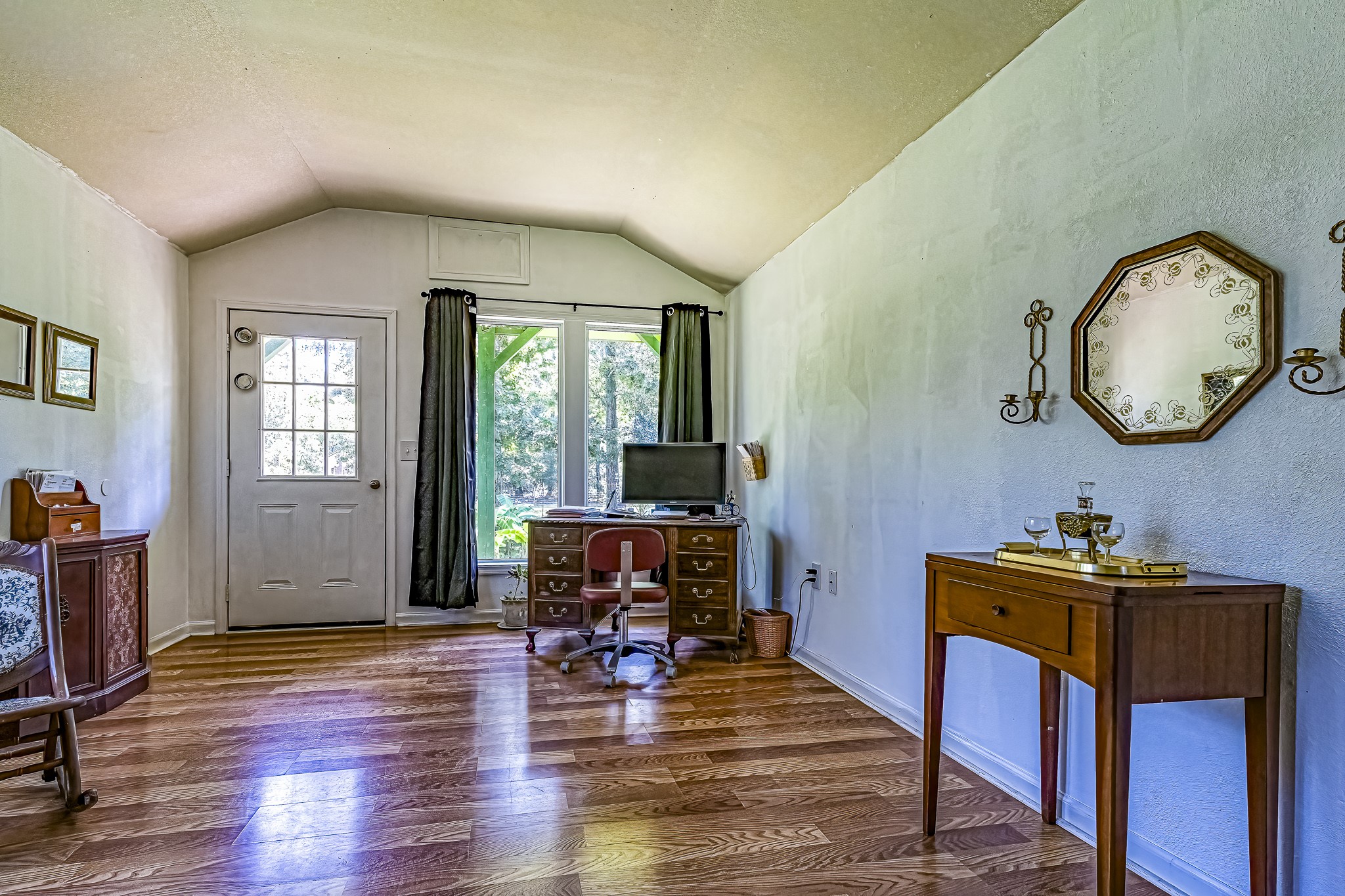 121 Tidwell Road Shepherd, TX 77371 - Photo 2 of 21 a living room with furniture a window and wooden floor
