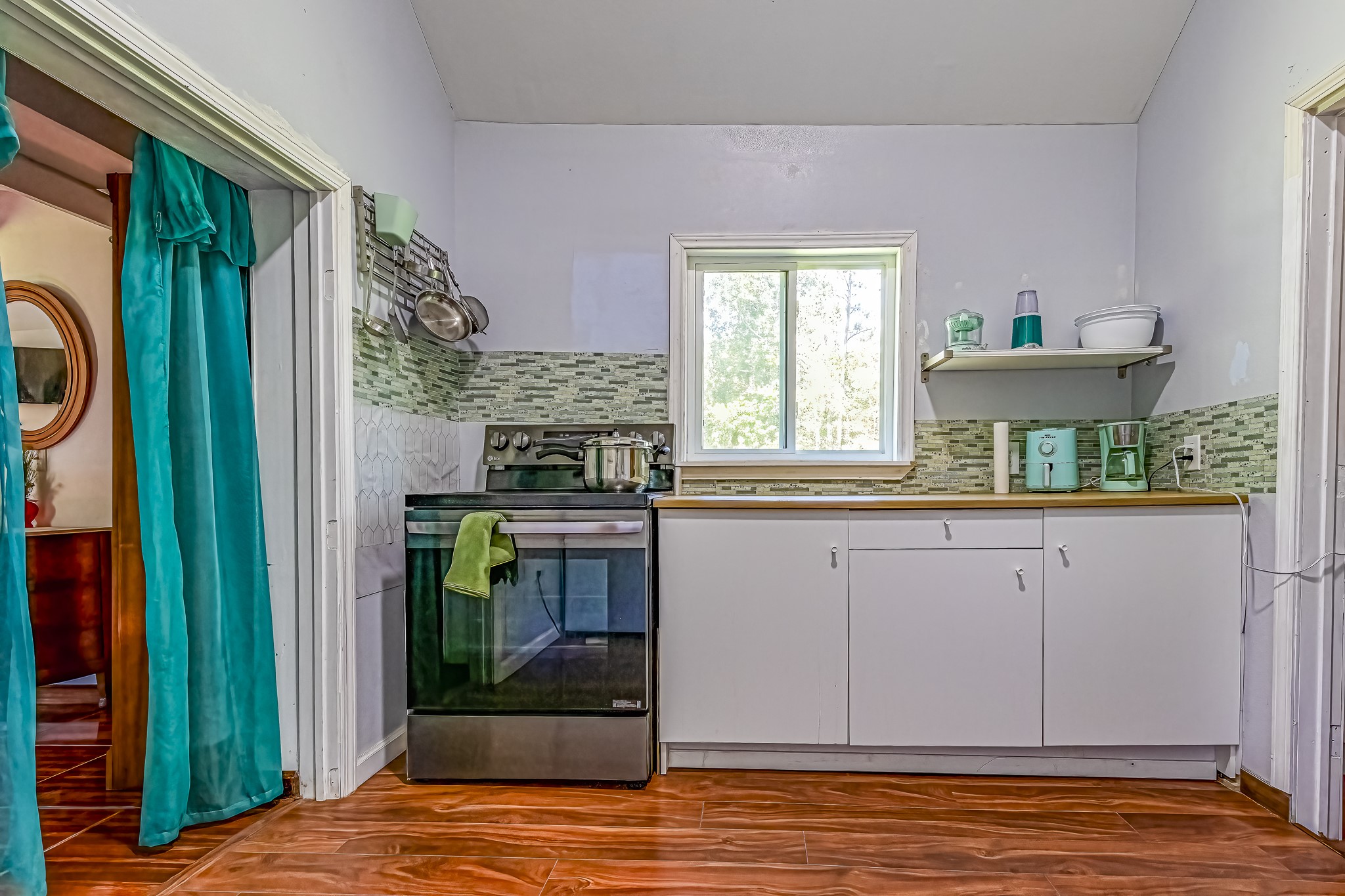 121 Tidwell Road Shepherd, TX 77371 - Photo 3 of 9 a view of kitchen with granite countertop cabinets