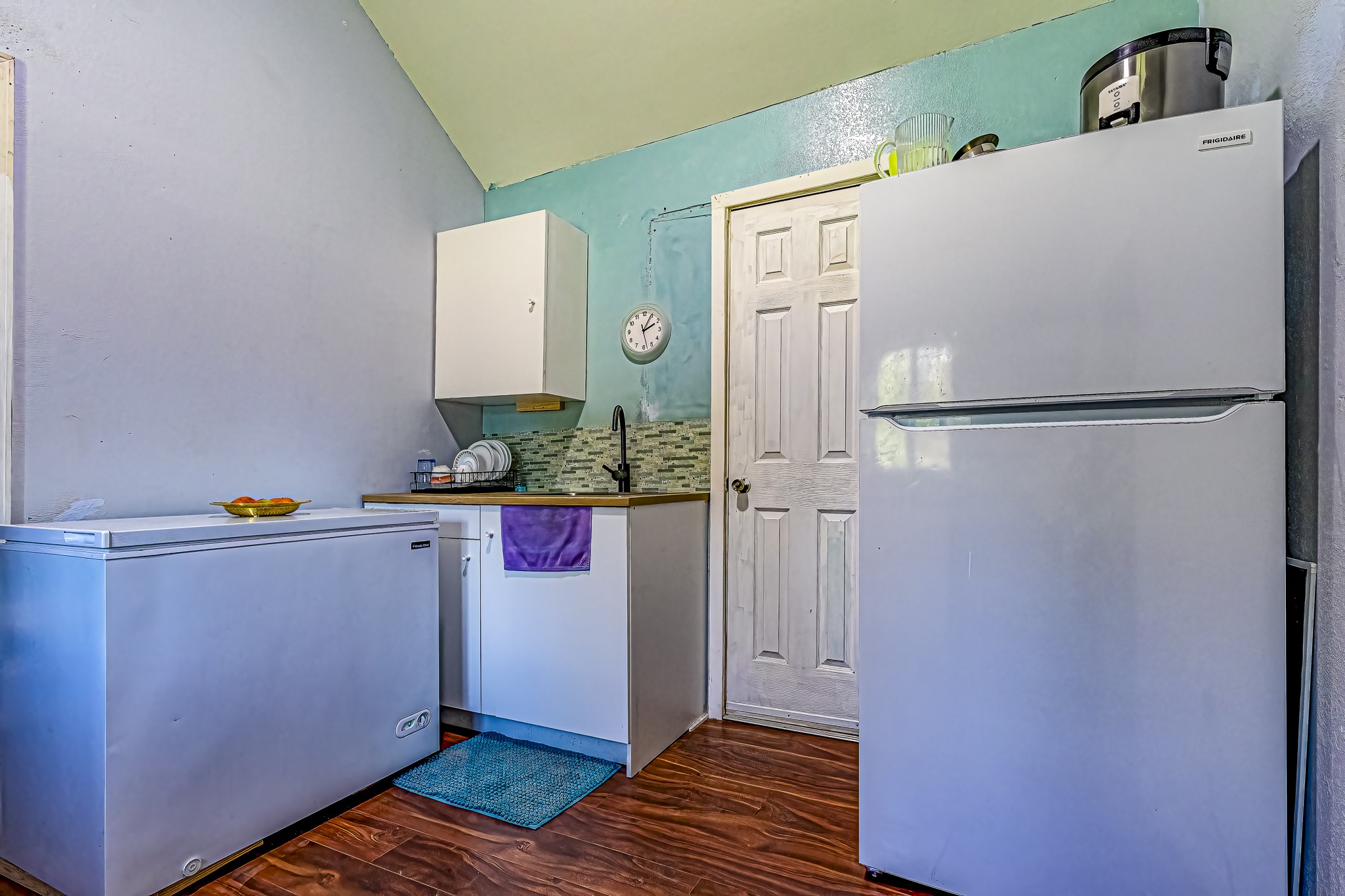 121 Tidwell Road Shepherd, TX 77371 - Photo 6 of 21 a white refrigerator freezer sitting inside of a kitchen